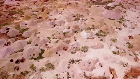 Aerial-drone-shot-of-opal-mines-and-mining-tailings-in-the-desert-outback-of-Coober-Pedy-Australia-6