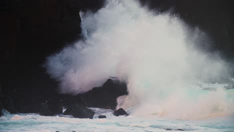 Waves-crash-against-a-rocky-shore