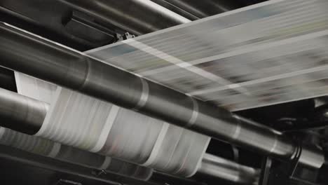 Tomorrow's-newspapers-are-printed-on-a-high-speed-printing-press-1