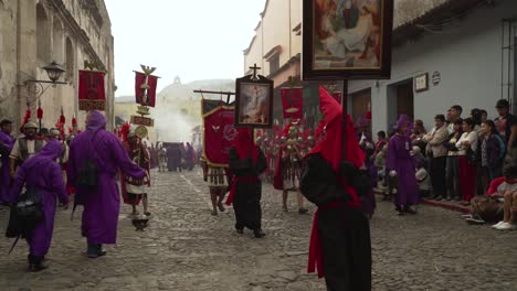 Priests-carry-religious-placards--in-a-colorful-Christian-Easter-celebration-in-Antigua-Guatemala