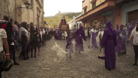 Robed-priests-carry-incense-burners-in-a-colorful-Christian-Easter-celebration-in-Antigua-Guatemala-1