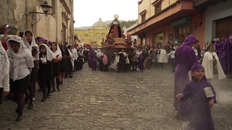 Robed-priests-carry-incense-burners-in-a-colorful-Christian-Easter-celebration-in-Antigua-Guatemala-2