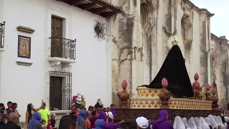 Women-carry-giant-statues-of-the-Virgin-mary-in-a-colorful-Christian-Easter-celebration-in-Antigua-Guatemala