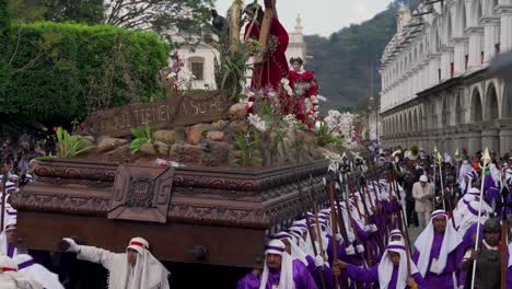 Robed-priests-carry-giant-coffins-in-a-colorful-Christian-Easter-celebration-in-Antigua-Guatemala-4