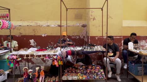 Souvenir-seller-selling-small-trinkets-on-the-street-in-the-city-of-Guanajuato-Mexico