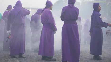 Purple-robed-Catholic-Christian-priests-march-in-the-Semana-Santa-Easter-week-holidays-in-Antigua-Guatemala-4