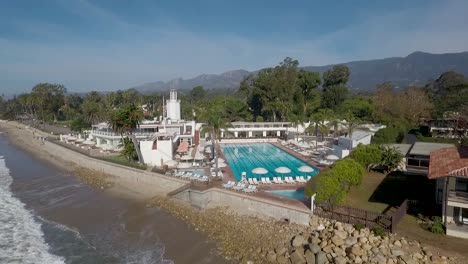 Beautiful-vista-aérea-of-Butterfly-Beach-the-Pacific-and-the-Coral-Casino-in-Montecito-California-3