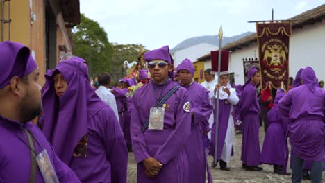 Cucharuchos-in-purple-robes-celebrate-Easter-in-streets-of-Antigua-Guatemala