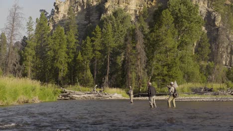 Three-fly-fisherman-casting-on-a-quiet-trout-stream-in-Central-Montana