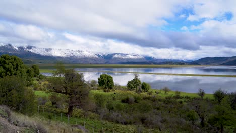 Dramatic-clouds-over-Laguna-Terraplen-and-the-snow-capped-mountains-of-Los-Alerces-National-Park-Argentina-1