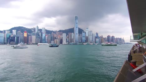 Panning-shot-across-Hong-Kong-harbor-and-skyline-with-clouds-1