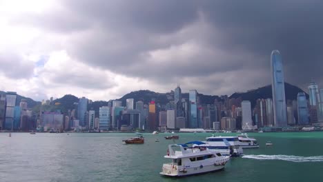 Panning-shot-across-Hong-Kong-harbor-and-skyline-with-clouds-2
