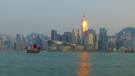 Panning-shot-across-Hong-Kong-harbor-and-skyline-with-clouds-3