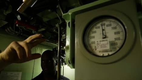 Navy-Sailors-Inspect-And-Maintain-The-Uss-Texas-A-Nuclear-Submarine-At-Sea-4