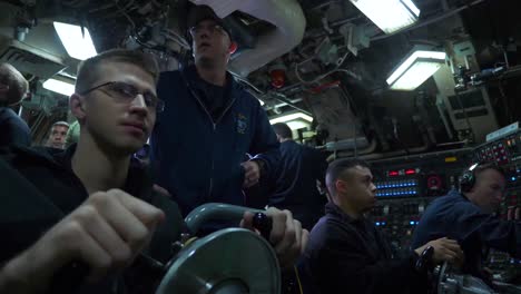 Navy-Sailors-On-The-Bridge-Steer-And-Control-The-Uss-Wyoming-A-Nuclear-Submarine-At-Sea