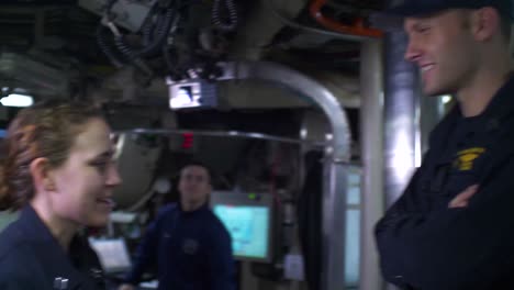 A-Female-Sailor-Interacts-With-The-Crew-On-The-Bridge-A-Us-Nuclear-Submarine