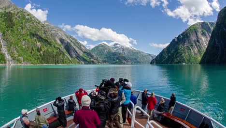 A-POV-time-lapse-shot-of-a-ship-bow-icebergs-and-tourists-passing-through-the-Tracy-Arm-Alaska