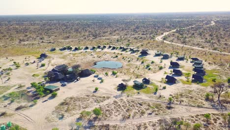Nice-aerial-over-a-safari-lodge-around-a-watering-hole-at-Chobe-National-Park-Botswana-Africa-3