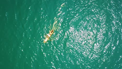Aerial-above-a-African-fishing-rowboat-on-beautiful-green-waters-of-the-ocean-in-Djibouti-or-Somalia