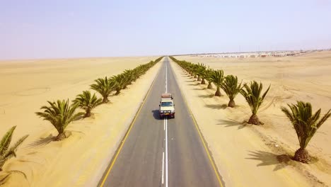 Aerial-over-a-4-WD-jeep-on-a-road-near-Swakopmund-Skeleton-Coast-namibia-Africa