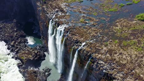 Beautiful-aerial-shot-of-majestic-Victoria-Falls-on-the-Zambezi-River-on-the-border-of-Zimbabwe-and-Zambia-inspiration-of-Africa
