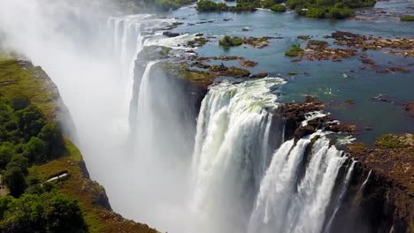 Aerial-shot-of-majestic-Victoria-Falls-on-the-Zambezi-River-on-the-border-of-Zimbabwe-and-Zambia-inspiration-of-Africa-4