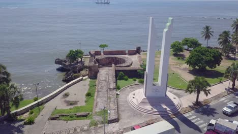 Aerial-over-statue-and-ocean-in-Santo-Domingo-Dominican-Republic