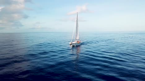Beautiful-aerial-of-a-sailboat-sailing-across-the-Caribbean-ocean-sea-near-the-island-of-St-Lucia-3