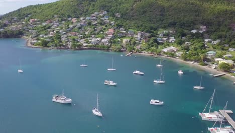 Aerial-establishing-shot-of-the-Caribbean-Island-of-St-Vincent-with-blue-bay-yachts-hotels-resorts-condos-and-luxury-homes-1