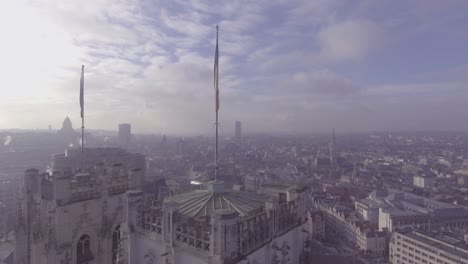 Aerial-of-a-mysterious-foggy-day-in-Brussels-Belgium-with-cathedral-churches-and-spires-in-foreground-1