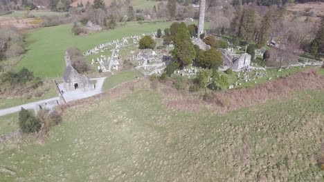 Aerial-over-the-Glendalough-Cemetery-in-Ireland-with-graves-and-visitors