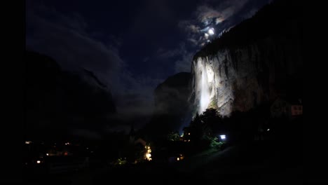 Time-lapse-of-a-waterfall-in-Switzerland-in-the-moonlight-at-night