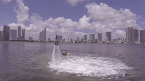 A-man-hovers-using-a-water-jetpack-flyboard-on-the-ocean-in-Miami-Florida-1