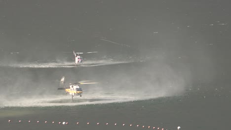 Helicopter-Refilling-Water-Drop-After-A-Brushfire-Holser-Fire-Burns-A-Hillside-Near-Lake-Piru-California-2