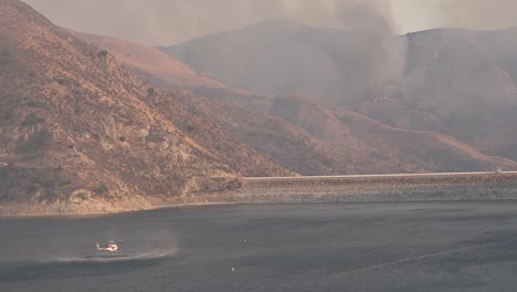 Helicopter-Refilling-Water-Drop-After-A-Brushfire-Holser-Fire-Burns-A-Hillside-Near-Lake-Piru-California-7
