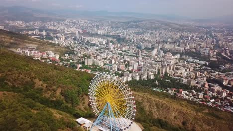 Aerial-Around-The-Tbilisi-Ferris-Wheel-In-The-Republic-Of-Georgia