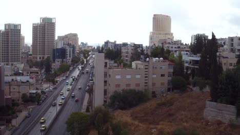 Aerial-Over-The-City-Of-Amman-Jordan-Downtown-Business-District-And-Traffic