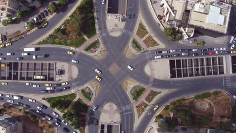 Aerial-Straight-Down-Of-Traffic-Circle-Or-Roundabout-With-Car-Traffic-Amman-Jordan-2