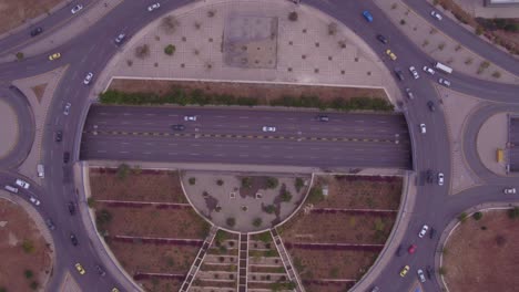 Aerial-Straight-Down-Of-Traffic-Circle-Or-Roundabout-With-Car-Traffic-Amman-Jordan-3