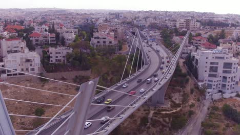 High-Aerial-Over-The-City-Of-Amman-Jordan-And-Abdoun-Bridge-With-Vehicle-Traffic-1