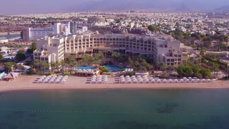 Aerial-Over-The-City-Of-Aqaba-Jordan-With-Large-Hotels-And-Beaches