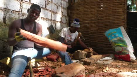 Men-Carve-Wood-To-Make-Souvenirs-On-The-Streets-Of-Bissau-In-Guineabissau-West-Africa