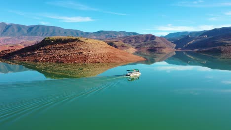 Aerial-Over-Pontoon-Tourist-Boat-On-Lake-Bin-El-Ouidane-Morocco-2