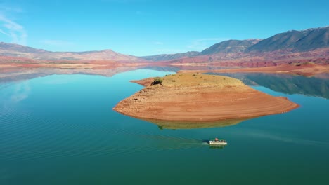 Aerial-Over-Pontoon-Tourist-Boat-On-Lake-Bin-El-Ouidane-Morocco-3