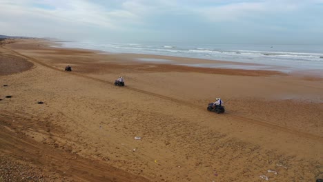 Tourists-Ride-Atvs-On-A-Beach-In-Essaouira-Morocco