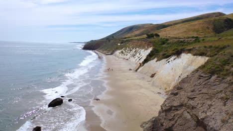 Aerial-Over-The-Beautiful-Coastline-Of-Santa-Barbara-California-Near-Gaviota-State-Beach-With-Fishermen-Below-1