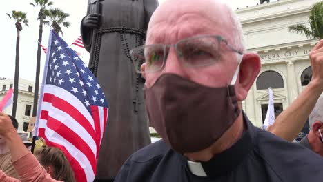 Catholic-Priest-Speaks-At-Chumash-American-Indian-Protest-Against-Father-Junipero-Serra-Statue-In-Front-Of-City-Hall-Ventura-California