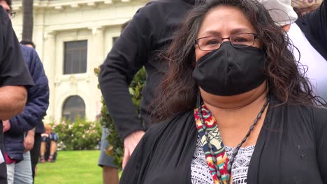 American-Indian-Woman-Burns-Incense-At-Chumash-Native-American-Protest-Against-Father-Junipero-Serra-Statue-In-Front-Of-City-Hall-Ventura-California