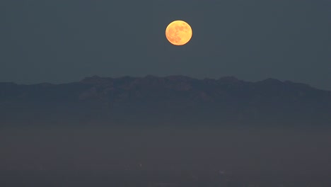 A-Full-Moon-Rises-Above-Los-Angeles-Suburbs-Malibu-Hills-Southern-California-Moonrise-1