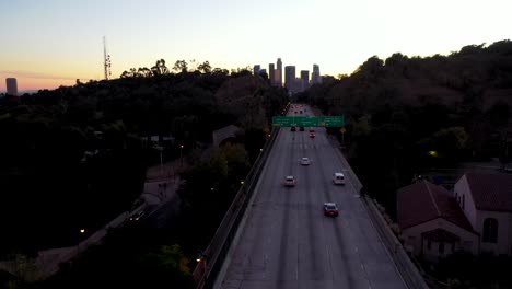 Night-Or-Dusk-Aerial-Over-The-110-Pasadena-Harbor-Freeway-And-Traffic-Leading-Into-Downtown-Los-Angeles-1